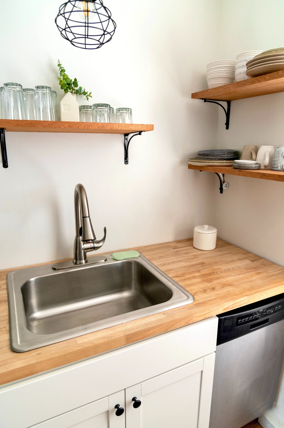 Wooden surroundings with kitchen sink