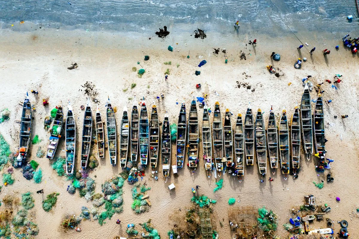 Polluted Ocean WTA different-colored-boats-sandy-beach-with-sea-nearby-wta
