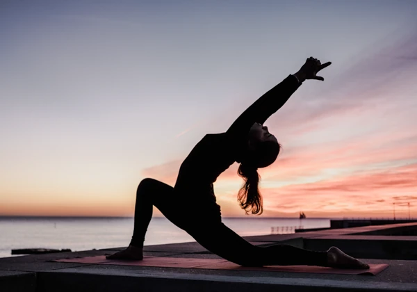 Woman Yoga on Beach